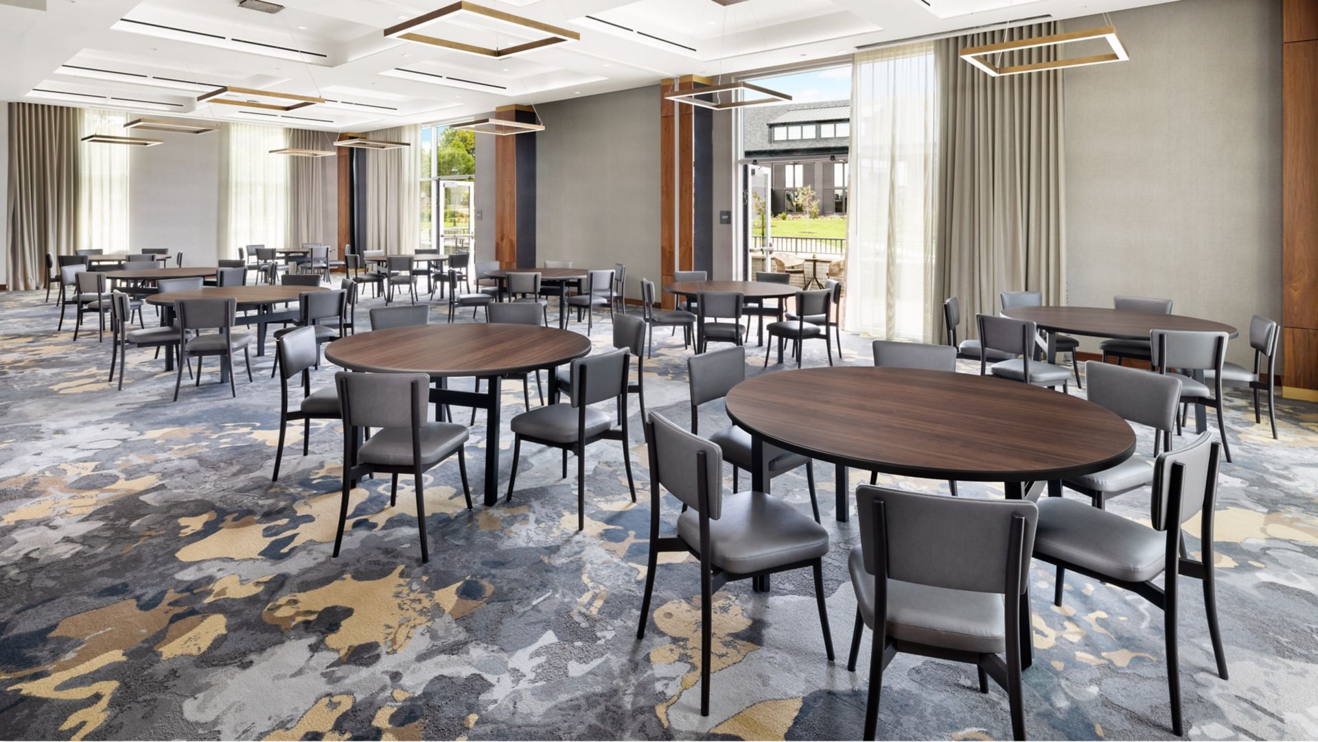 AC Hotel Newtown Square event-space setup with round tables